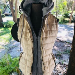 YMI puffer style vest with sweatshirt detail.